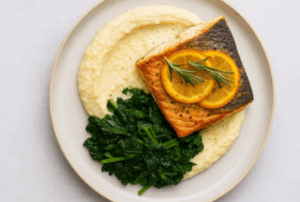 Citrus-Rosemary Seared Salmon with Cauliflower Purée and Sautéed Greens​